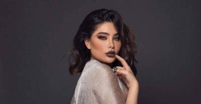 قمر تحتفل بخروج انجي خوري من السجن