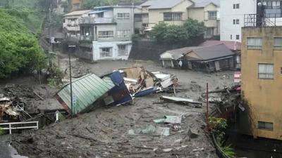 Title: Video Captures Terrifying Moment of Landslide Engulfing Homes in Japanese City