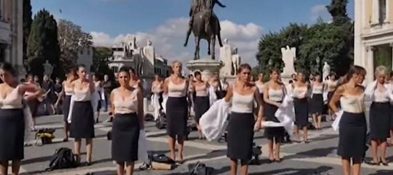 Flight Attendants of Alitalia Remove Their Uniforms in Protest Against Job Terminations