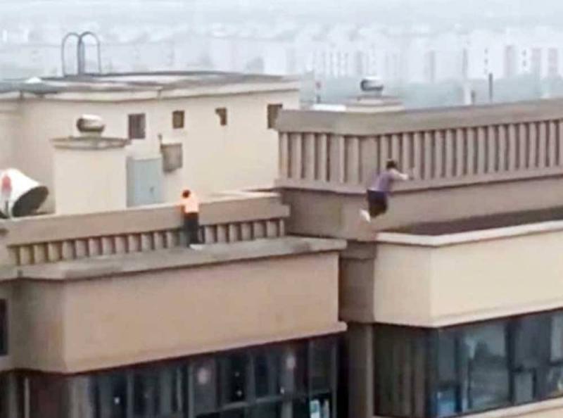 Breath-Taking Video of Two Children Jumping from a Skyscraper