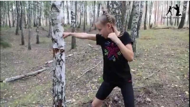 Supergirl Shatters Tree Trunk with Her Punches (Video)