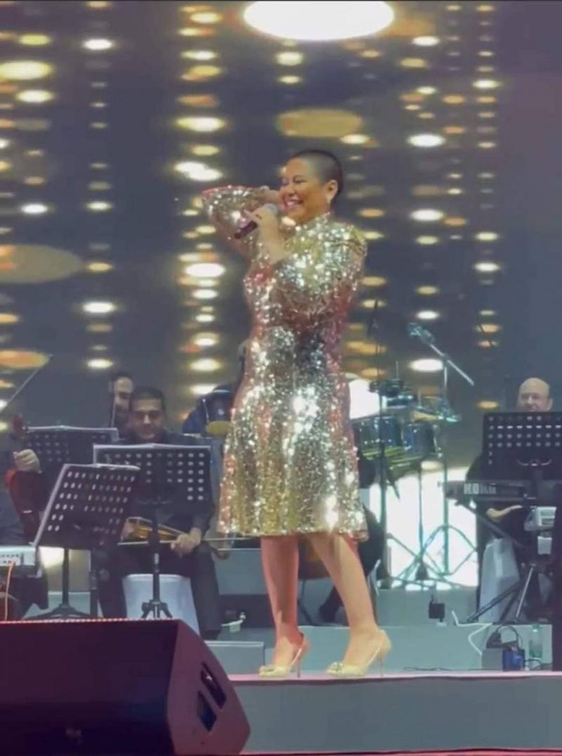 Shocking Appearance: Sherine Shaved Head in Abu Dhabi