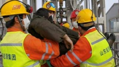 Rescue Workers in China Extract Miners from Their Trap