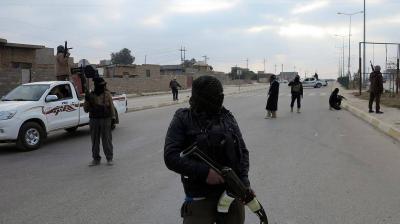 Title: Thirteen Iraqi Police Officers Killed in ISIS Attack Near Kirkuk