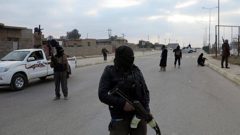 Title: Thirteen Iraqi Police Officers Killed in ISIS Attack Near Kirkuk