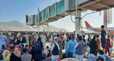 Video: Hundreds of Afghans Rush to Airport Fleeing Taliban as U.S. Forces Fire to Deter Them