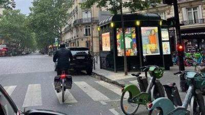 Ambassador Arrives on Motorcycle to Vote