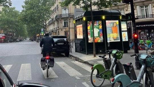 Ambassador Arrives on Motorcycle to Vote