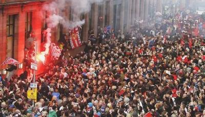 Title: Fans Storm Old Trafford Ahead of Liverpool Match