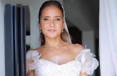 Title: Nelly Karim Wears White Dress After Wedding Postponement