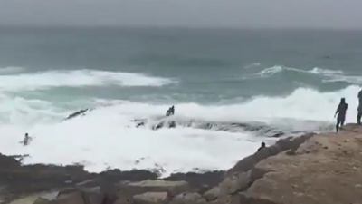 Waves Pull a Family of 5 in Oman