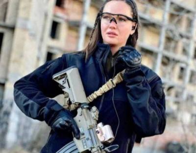 Ukrainian Beauty Queen Threatens Russian Soldiers with Sniper Fire