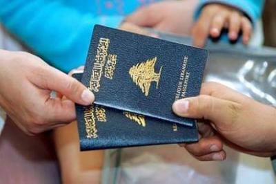 Minister Signs... Passport Crisis Will Soon Be Resolved