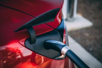Tesla's Plan to Overcome the Crisis Strangling the Global Automotive Industry
