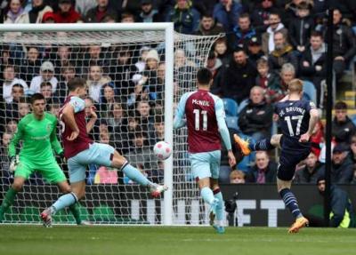 Title: Manchester City Regains Top Spot in the League from Liverpool