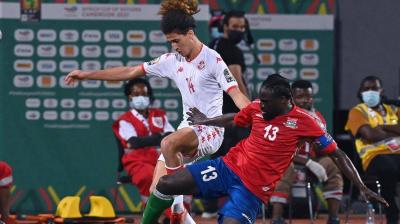 Title: Gambia Sends Tunisia to Face Nigeria