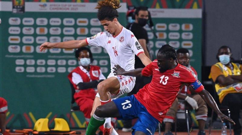 Title: Gambia Sends Tunisia to Face Nigeria