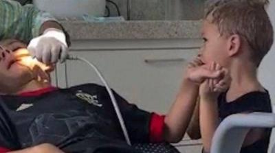 Title: Cute Video: Three-Year-Old Supports Older Brother During Tooth Extraction