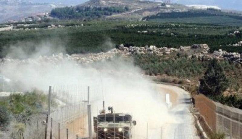 Israeli Forces Patrol the Road Adjacent to the Border Fence
