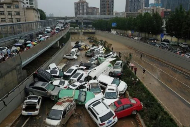 Title: Flood Death Toll in China Rises to 33 with 8 Missing