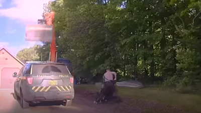Father Attacks Police with Excavator to Prevent Son's Arrest