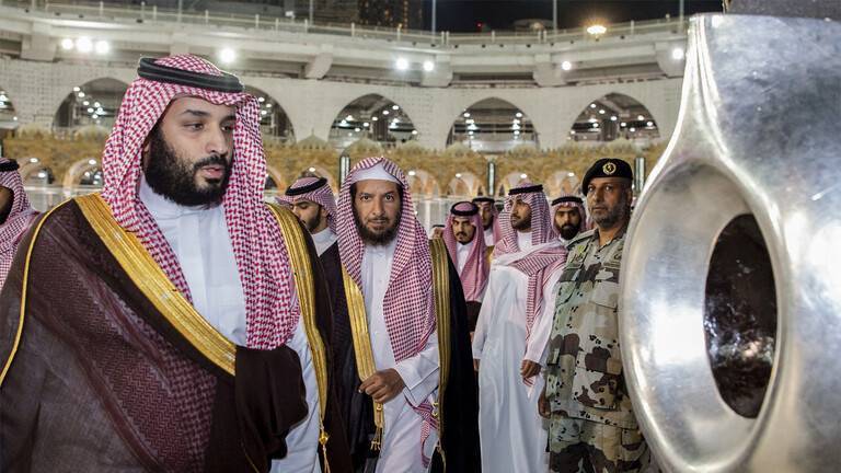Mohammed bin Salman Participates in Washing the Kaaba