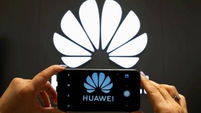 US Sanctions Clip Huawei's Wings: China's Giant Seeks to Survive