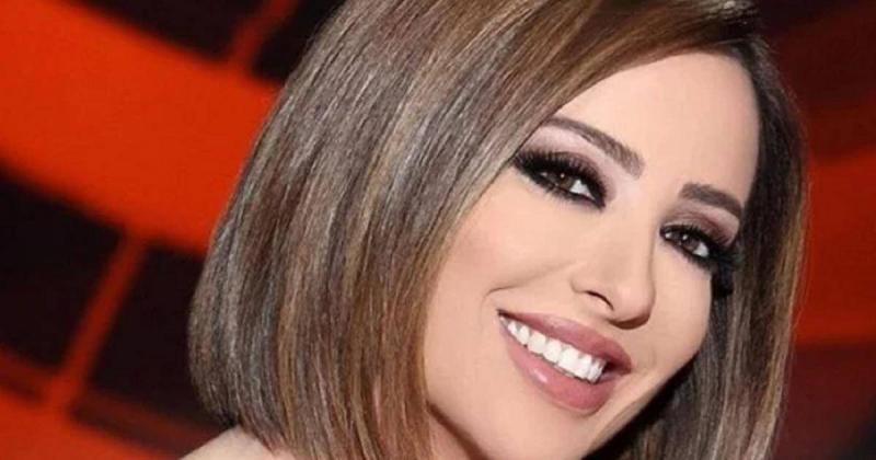 Title: Waafa Kilani Addresses Rumors About Her Separation from Syrian Artist Taim Hassan with a Photo