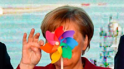 Germans Vote... and Merkel Breaks Free from Constraints and Has Some Fun!