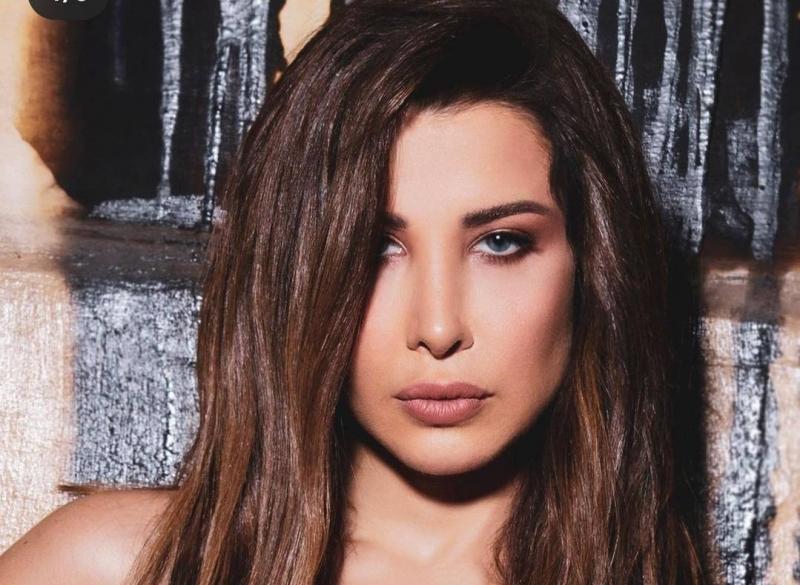 Title: Nancy Ajram Celebrates Daughter Leya's Birthday with Family Photos
