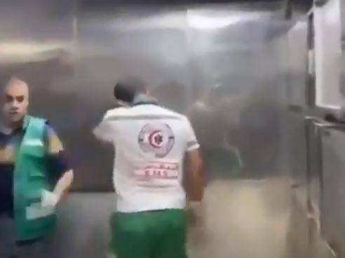 Title: Video Captures Paramedic's Hysterical Crying After Seeing Victims' Remains from Israeli Shelling