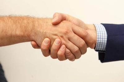 Title: Iraqi Officials Resign Due to a Handshake Incident