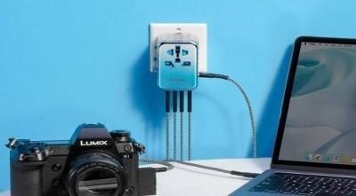 # The World's First Travel Adapter for Fast Charging All Your Devices