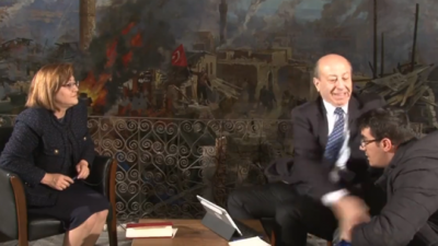 Video: Journalist Attacks Photographer During Interview, Widespread Condemnation Follows