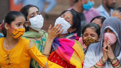 India Warns of a "Dismal" Battle Against COVID-19 Amid Record Surge in Infections