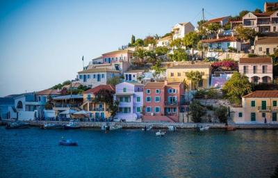 # Greece Opens Its Doors to Tourists as Americans Ditch Masks