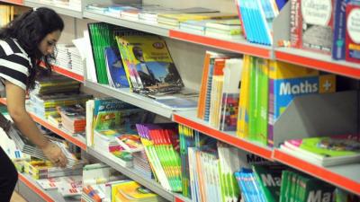 # The Mafia of School Book Trade: Payments in Dollars and "Fluid" Prices