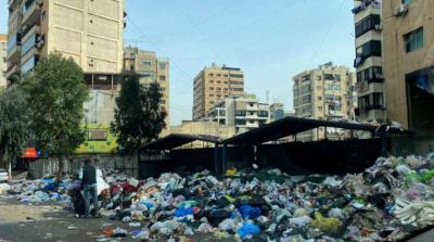 Al-Liwaa: Gifts Between the Holidays: No Bread Today... and Waste Threatens the Streets!
