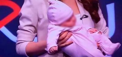 Title: Host Holds Her Baby on Air... Audience Criticizes Her