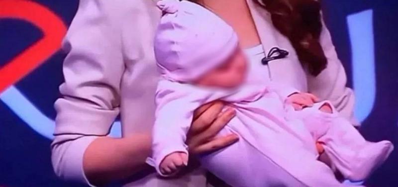 Title: Host Holds Her Baby on Air... Audience Criticizes Her