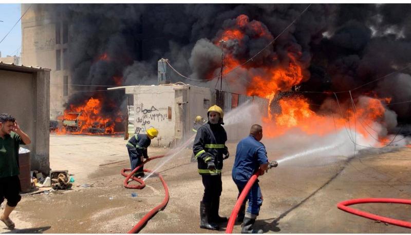 Extinguishing a Fire in Central Baghdad