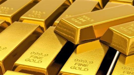 Gold Rises as Dollar Stops Climbing