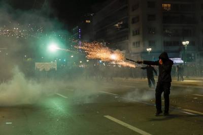 Title: Clashes in Athens between Police and Protesters After Train Collision