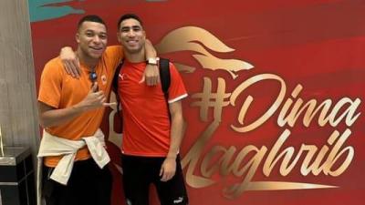 After Spain's Elimination: Mbappé Celebrates with Morocco Star