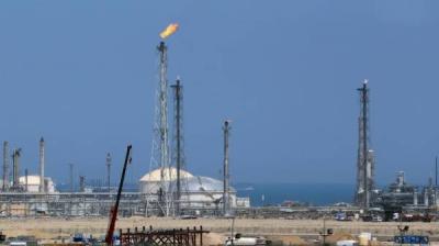 Title: "Kuwait Oil Company Handles Limited Fire at Well"
