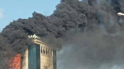 Title: Major Fire at Zitouna Bank in Tunisia