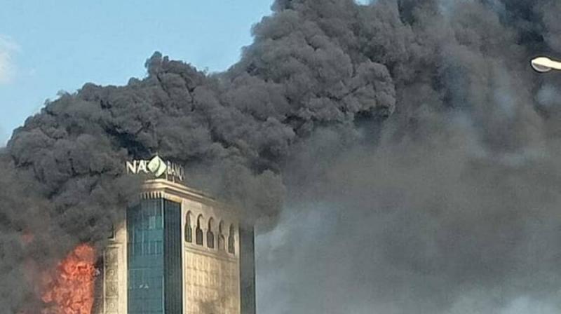 Title: Major Fire at Zitouna Bank in Tunisia