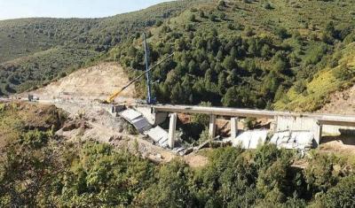 Excavator Suspended in Air After Bridge Collapse