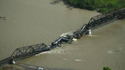 Bridge Collapse Leads to Train Derailment of Hazardous Materials