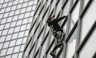 Protest Against Macron's Law: Climbing a Skyscraper